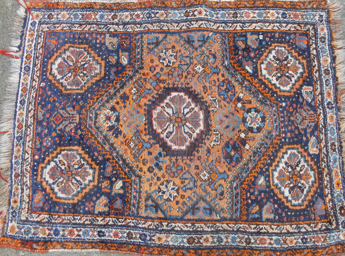 Appraisal: An early thC Middle Eastern rug predominantly in red and