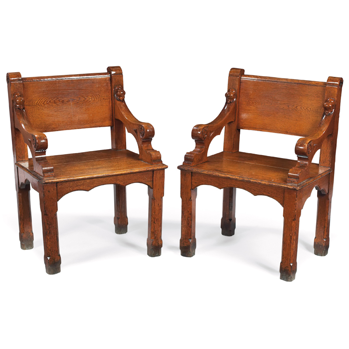 Appraisal: Aesthetic Movement chairs pair carved arms over a slab seat