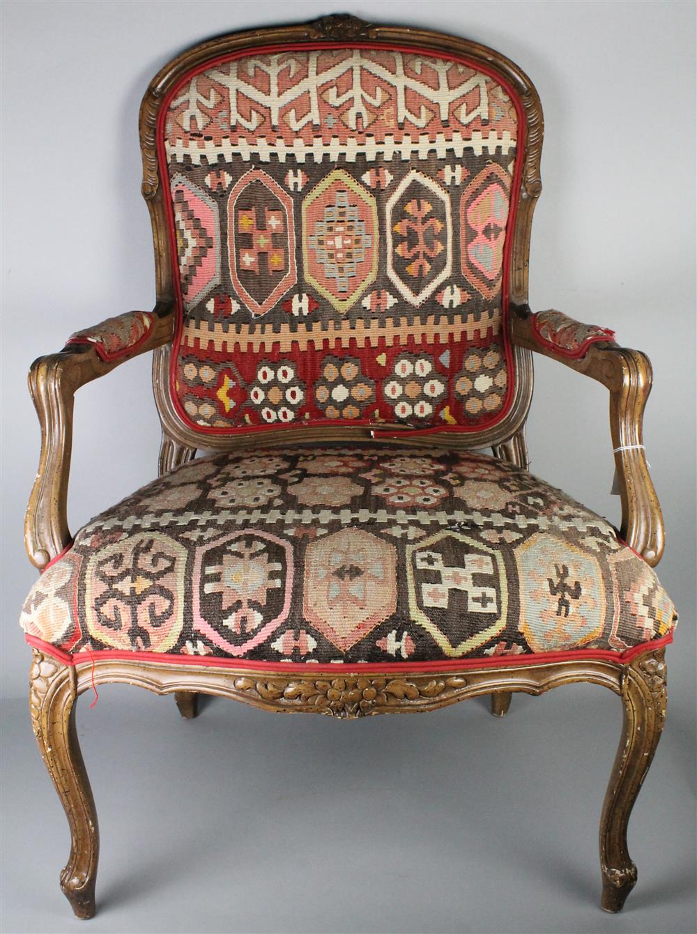 Appraisal: LOUIS XV STYLE KILIM UPHOLSTERED OPEN ARM CHAIR having a