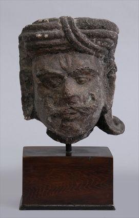 Appraisal: INDIAN CARVED STONE HEAD OF A NOBLEMAN in