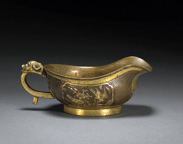 Appraisal: A parcel gilt miniature cup th Century Of low ovoid