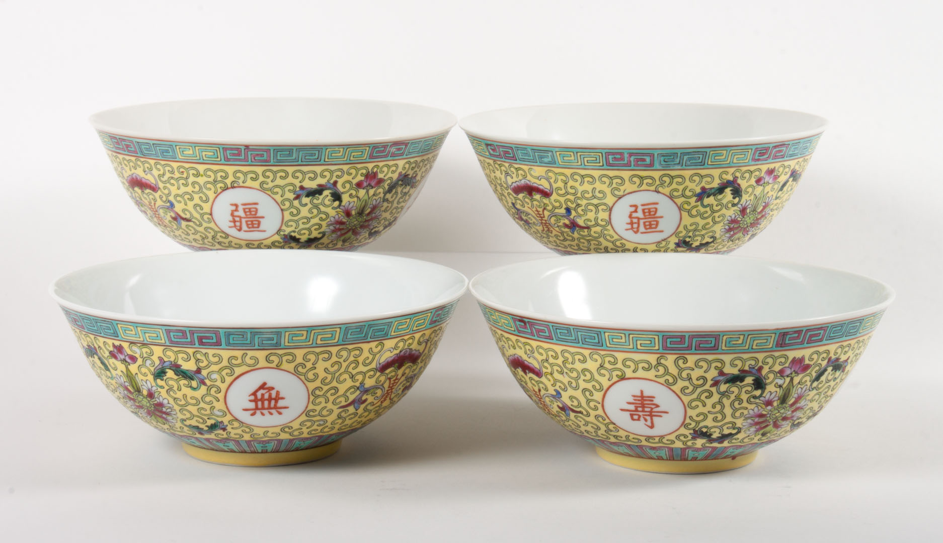 Appraisal: Four Chinese Famille Juane porcelain bowls