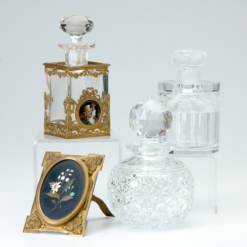 Appraisal: Three crystal perfume bottles and a pietra dura and bronze