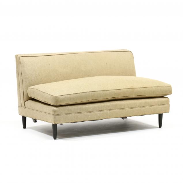 Appraisal: ATTRIBUTED T H ROBSJOHN-GIBBINGS MID-CENTURY SETTEE s over-upholstered armless frame