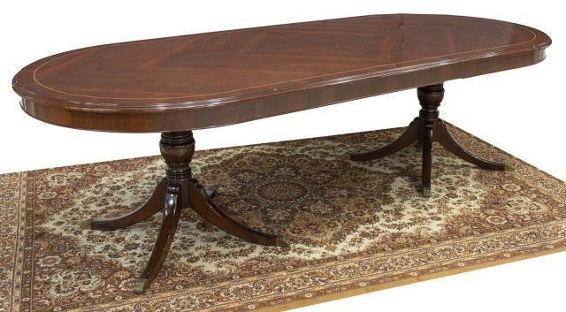 Appraisal: Georgian style mahogany dining table th c banded top with