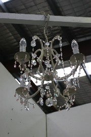 Appraisal: A French provincial pink and clear crystal chandelier