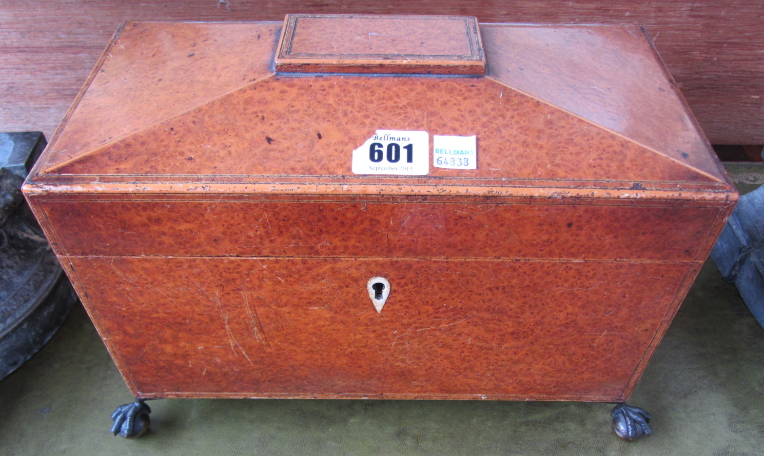 Appraisal: An early th century burr yew sarcophagus tea caddy with