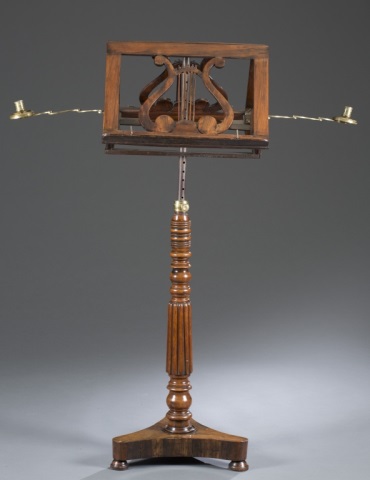 Appraisal: Rosewood Lyre-shaped supports and two brass sconce arms on turned