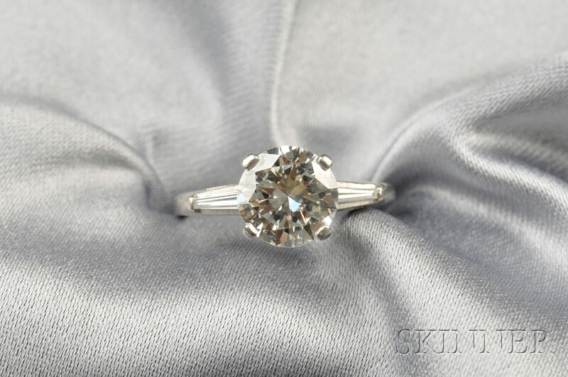 Appraisal: Platinum and Diamond Solitaire prong-set with a full-cut diamond weighing