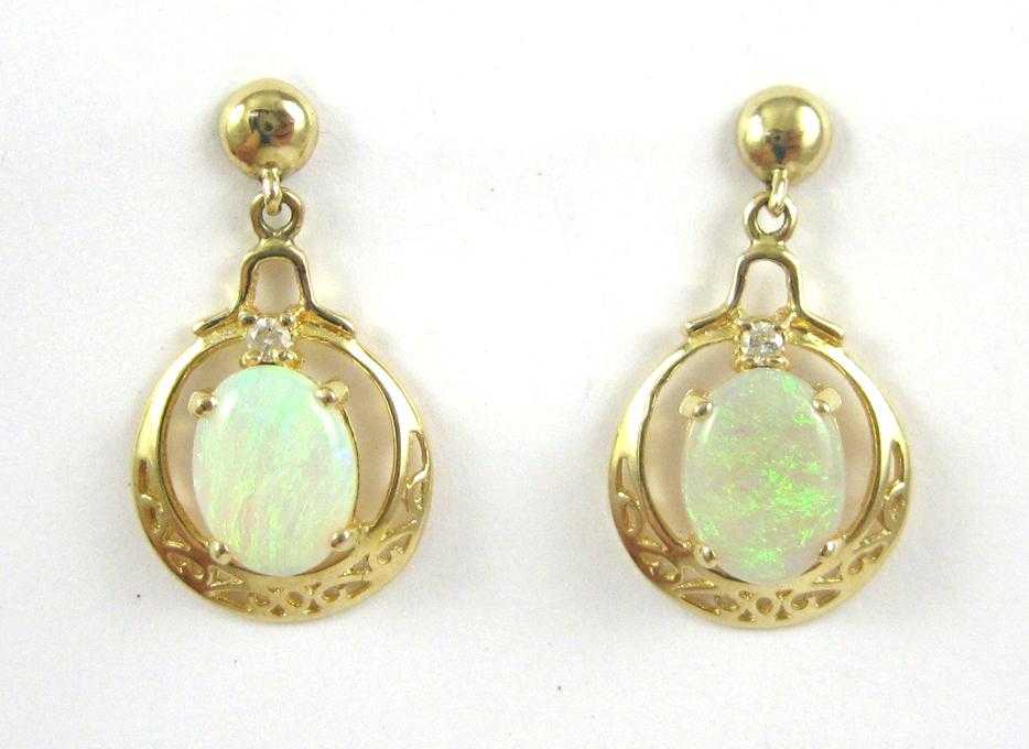 Appraisal: PAIR OF OPAL AND YELLOW GOLD EARRINGS each k gold