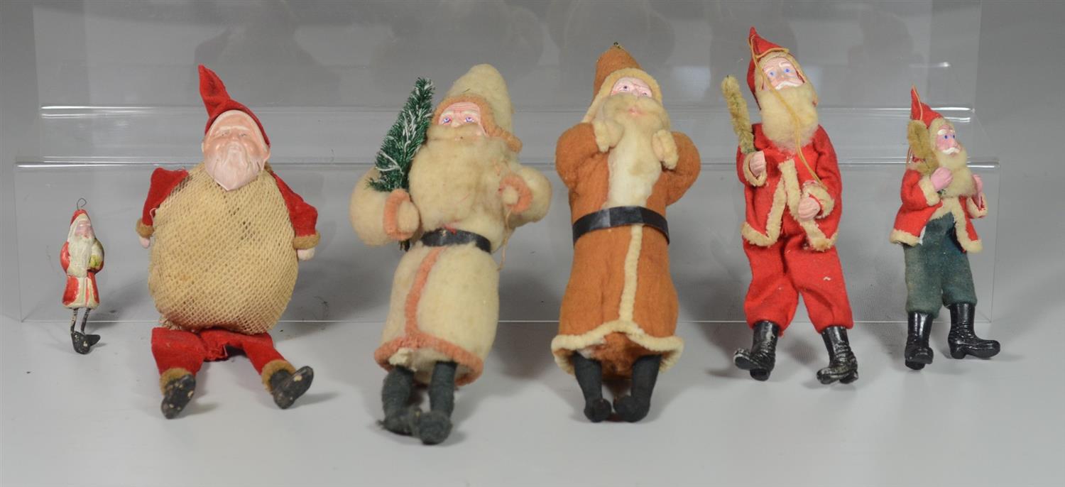 Appraisal: Santa figures cotton felt variously compo celluloid faces and hands