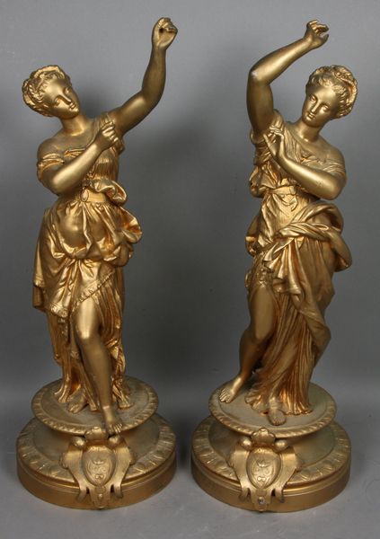 Appraisal: Pair of th C bronzed white metal female figurines h