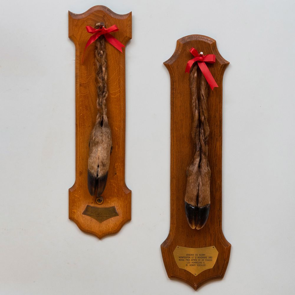 Appraisal: Two French Deer Hoof Hunting Trophies Mounted on wood backing