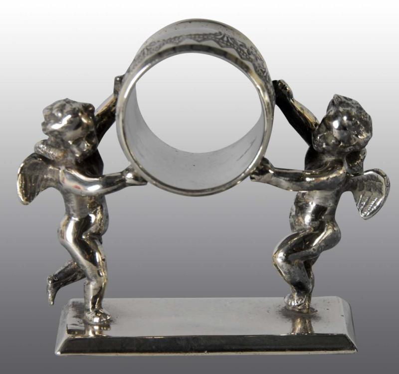 Appraisal: Double Cherubs Holding Figural Napkin Ring Description Marked Original made