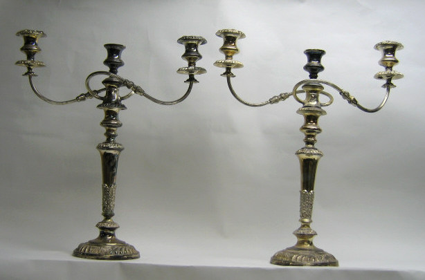 Appraisal: PAIR OF GEORGIAN STYLE THREE-LIGHT CANDELABRA Plated silver bearing mark