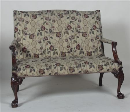 Appraisal: A Chippendale style mahogany framed sofa the high cushioned back