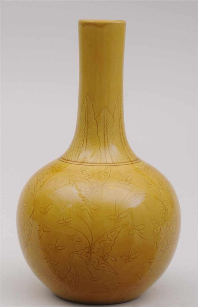 Appraisal: KANG XI YELLOW-GLAZED PORCELAIN BOTTLE VASE Bearing the Kang Xi