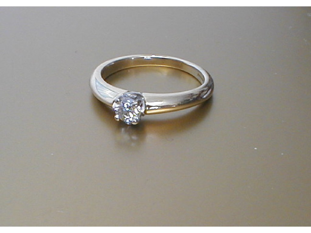 Appraisal: A diamond solitaire ring a round brilliant cut stone of