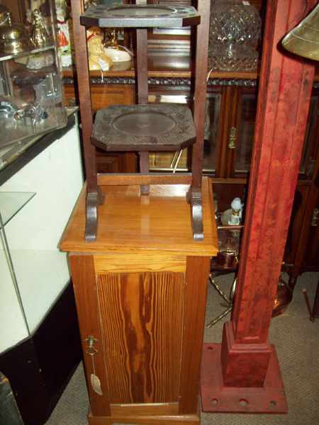 Appraisal: AN OAK THREE TIER STAND AND A PINE POT CUPBOARD