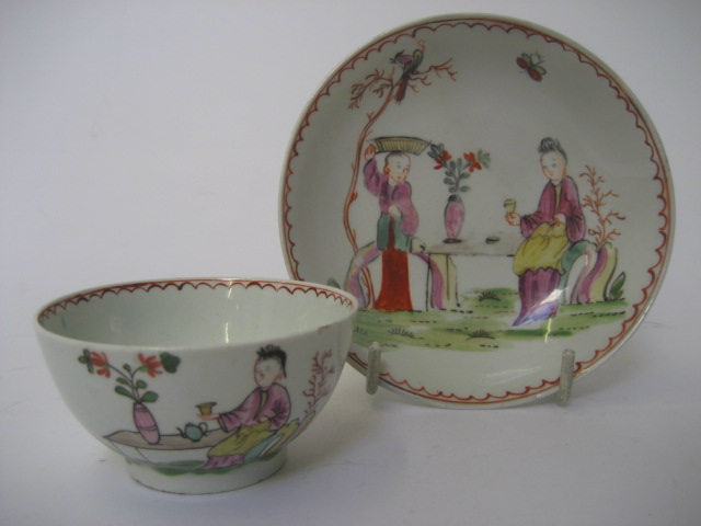 Appraisal: A LOWESTOFT PORCELAIN TEA BOWL AND SAUCER c painted in