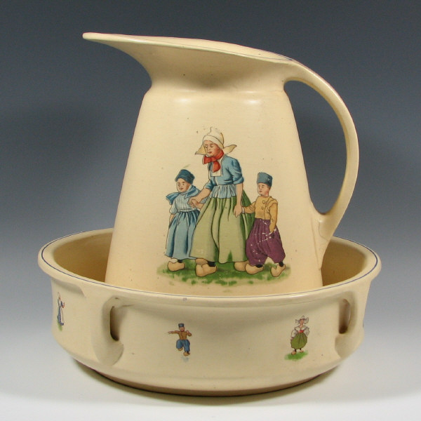 Appraisal: Roseville Dutch Creamware Pitcher Bowl Set Roseville Dutch Creamware large