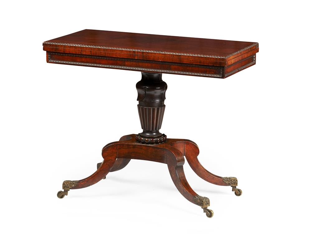 Appraisal: WILLIAM IV ROSEWOOD FOLDOVER GAMES TABLE CIRCA The pivoting rectangular