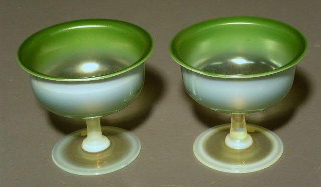 Appraisal: Pair of Tiffany green glass compotes in the Moonstone pattern