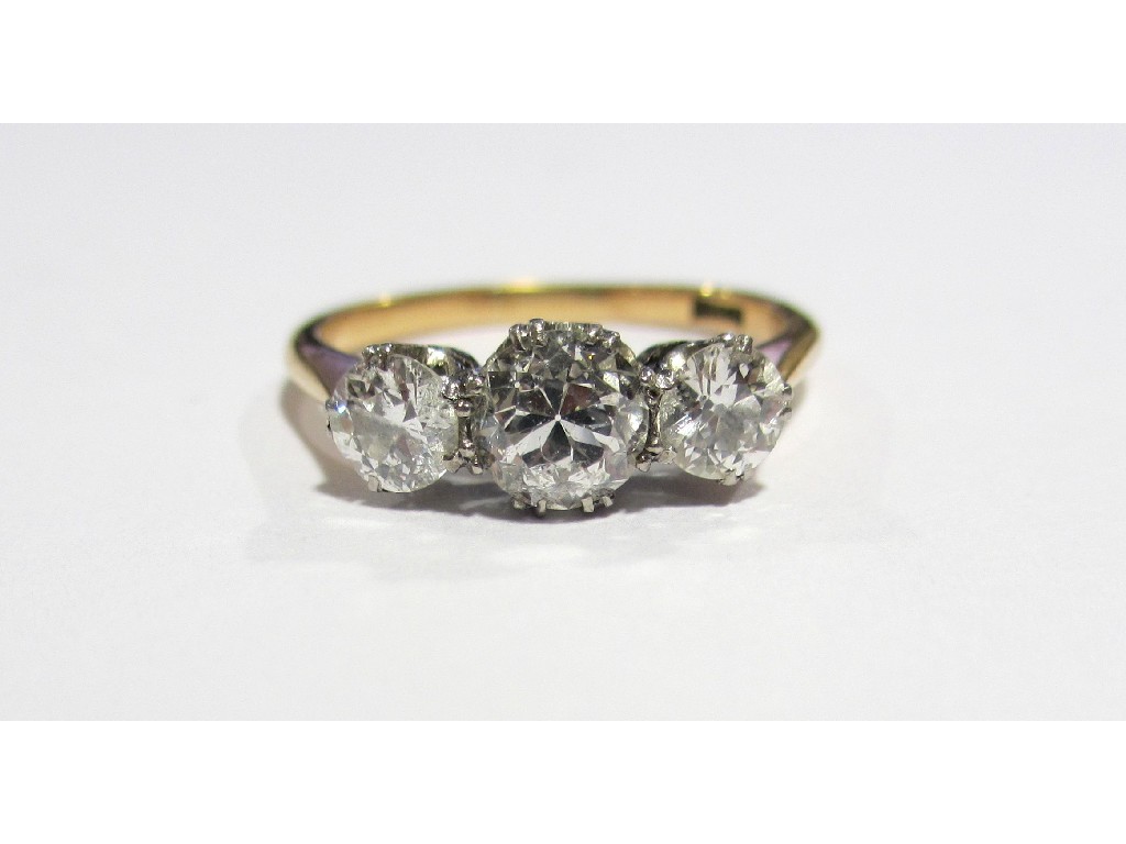 Appraisal: A diamond three stone ring the graduated brilliants of approx