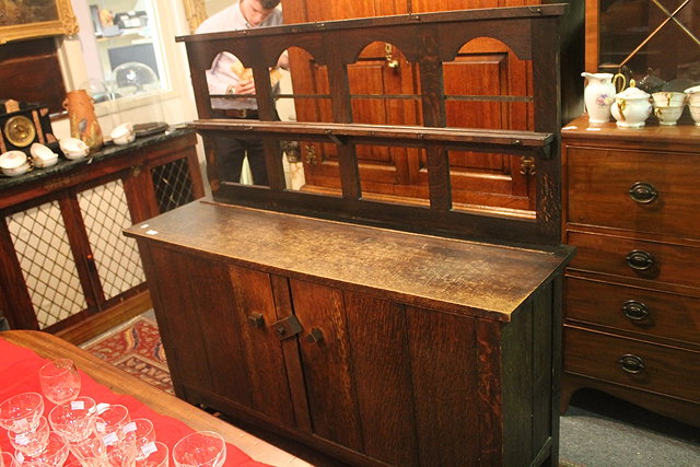 Appraisal: AN ARTS AND CRAFTS OAK DRESSER in the manner of