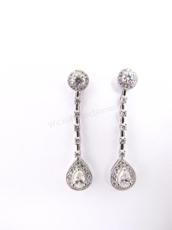 Appraisal: A pair of K white gold pear shaped and round