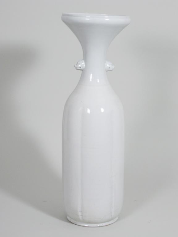 Appraisal: A large Japanese white porcelain Vase with mask handles in