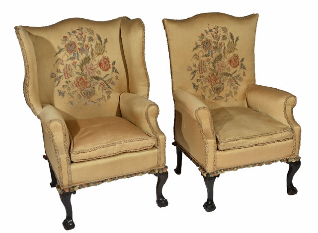 Appraisal: AN TH CENTURY STYLE MAHOGANY AND UPHOLSTERED WING ARMCHAIR and