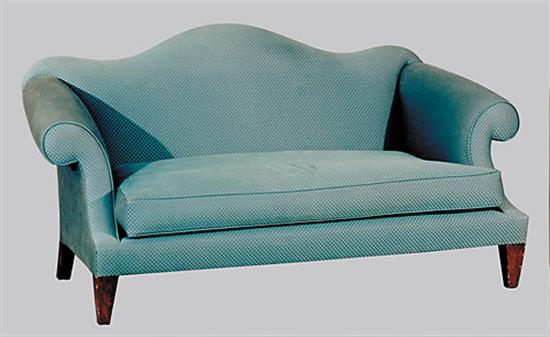 Appraisal: Pair Donghia upholstered sofas exaggerated form camelback issuing outscrolled arms