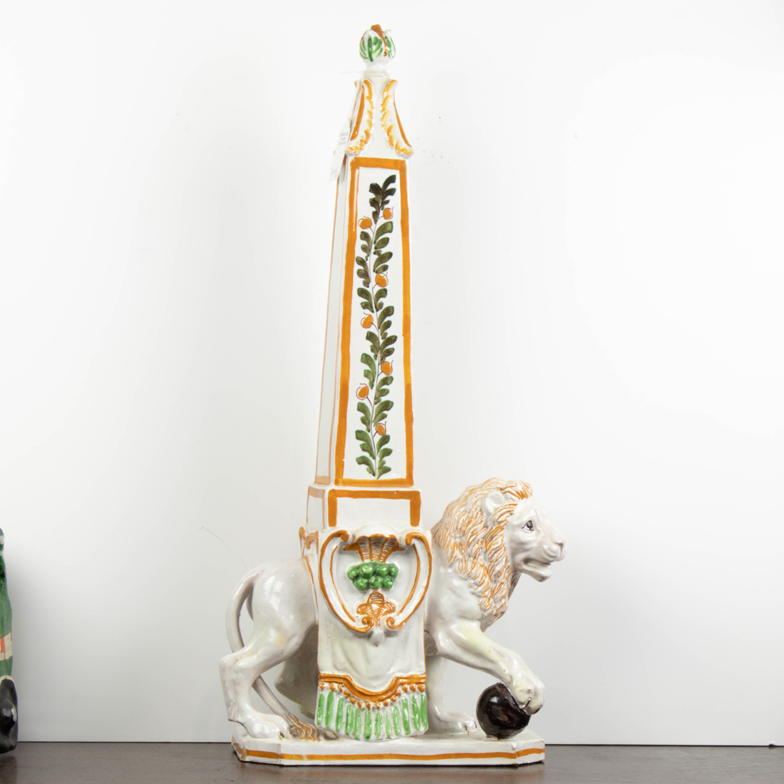 Appraisal: CONTINENTAL FAIENCE OBELISK Continental faience obelisk modeled raised on the