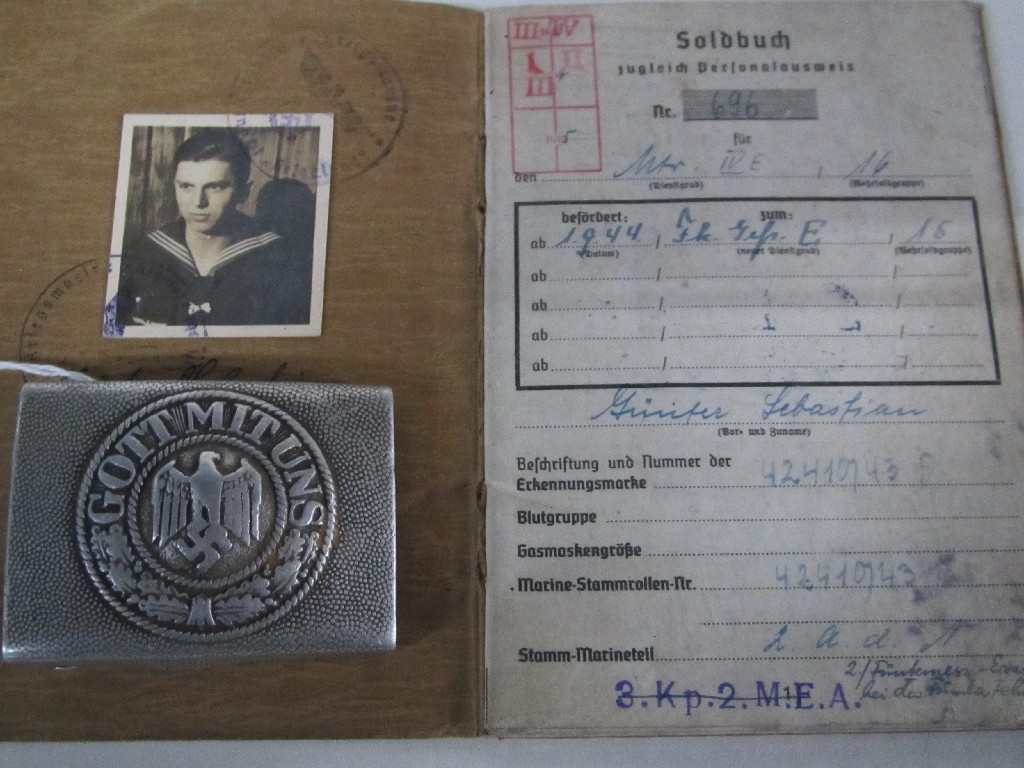 Appraisal: Lot comprising WWII German belt buckle German sailor's passport assorted