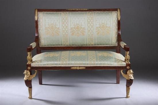 Appraisal: FRENCH EMPIRE-STYLE BURLED WALNUT SETTEE th century Back-scrolled crest surmounts