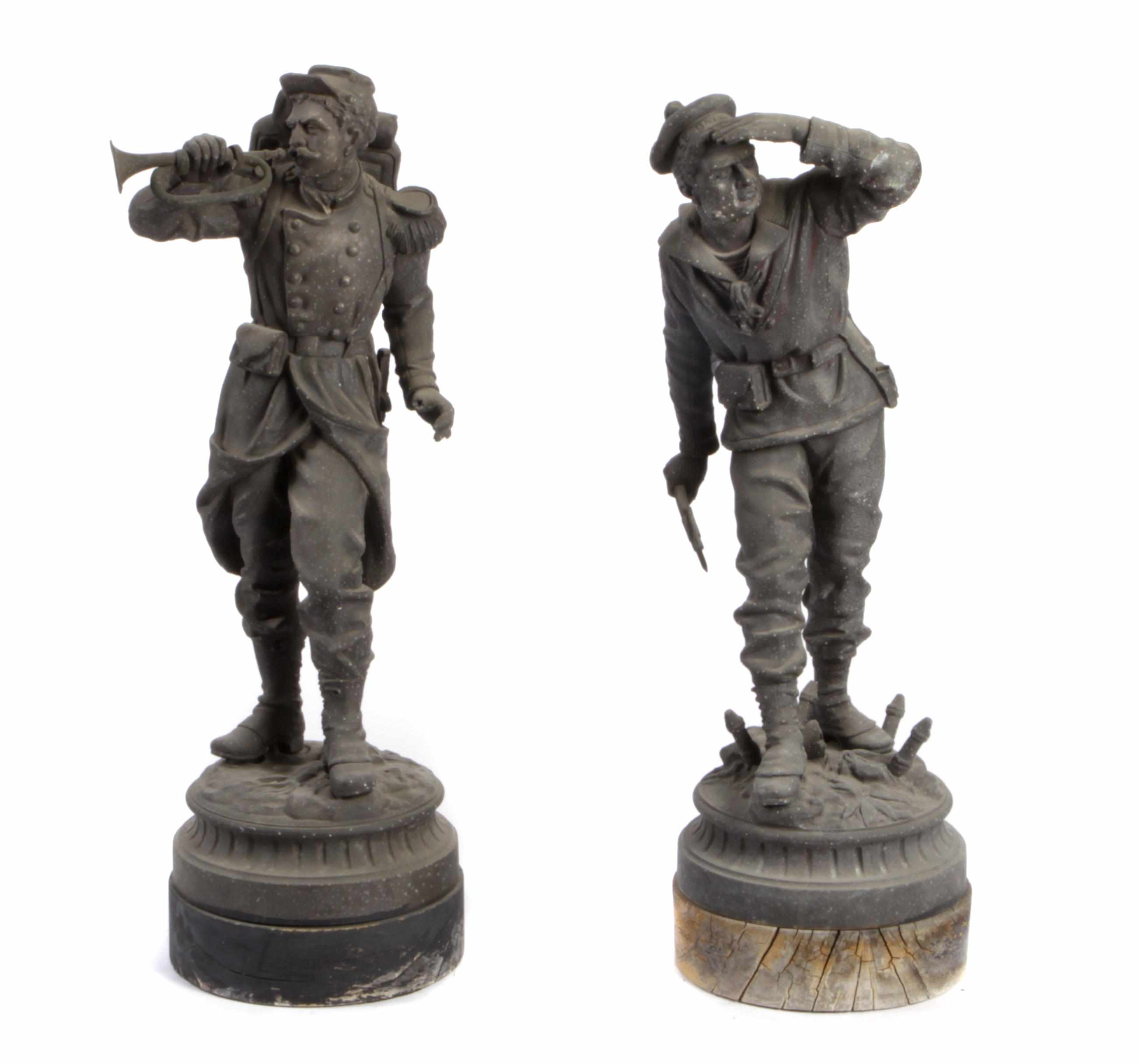 Appraisal: A pair of patinated metal soldiers height in