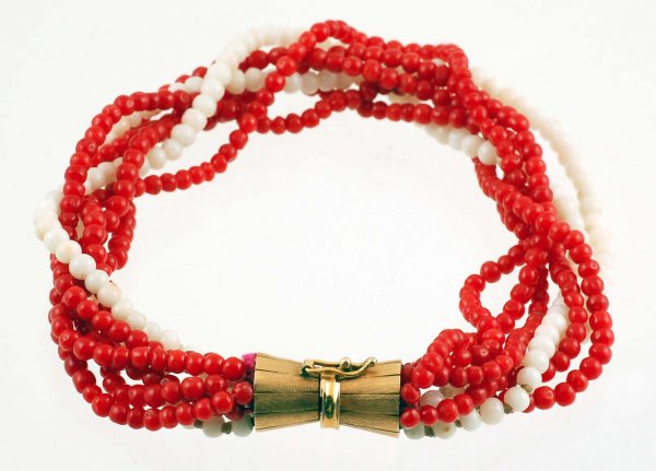 Appraisal: White and red multi-strand coral bead bracelet with marked K