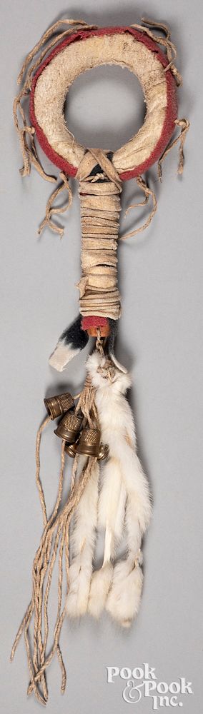 Appraisal: Blackfeet Indian rawhide ceremonial rattle Blackfeet Indian rawhide ceremonial rattle