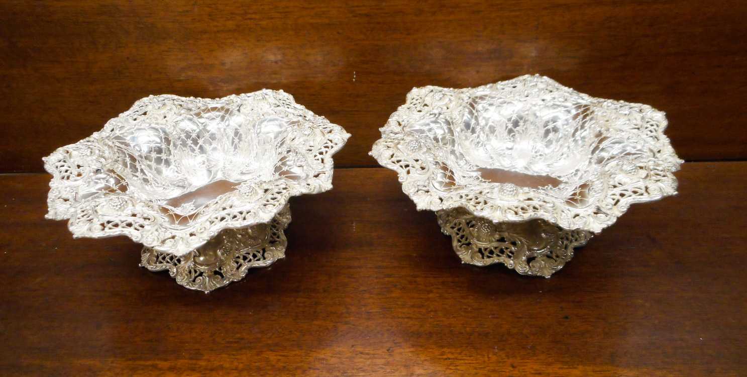 Appraisal: PAIR OF STERLING SILVER COMPOTES with relief floral motif and