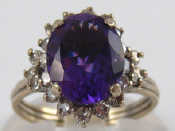 Appraisal: A white metal tests carat gold amethyst and diamond ring