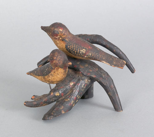 Appraisal: Pair of carved and painted birds on a root perch