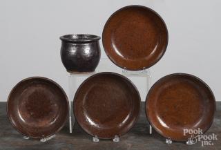 Appraisal: Four redware shallow bowls together with a small crock ''