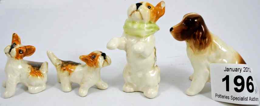 Appraisal: Beswick Dog Seated Model Dog Howling Model right leg broken