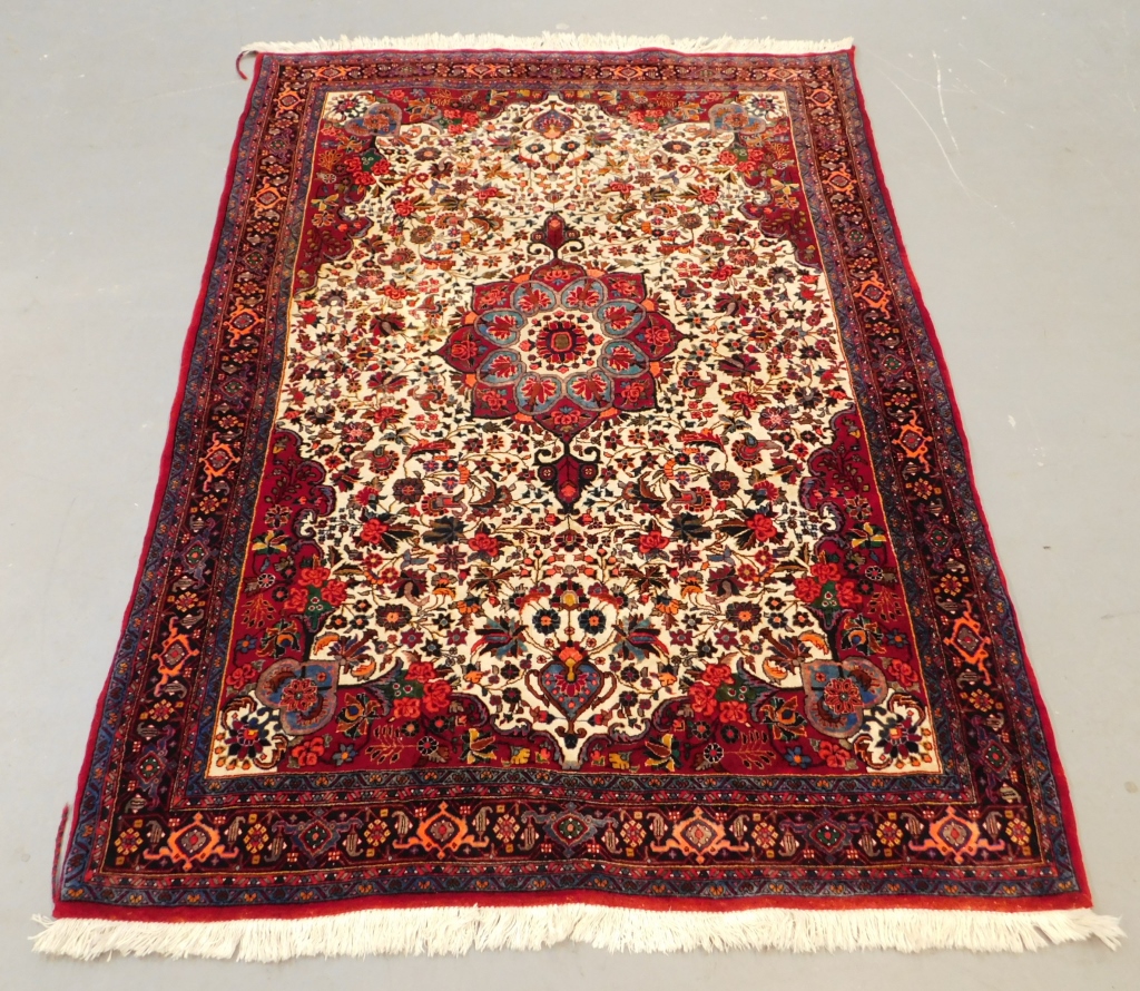 Appraisal: ANTIQUE BIDJAR MAROON MEDALLION RUG Persia Circa Central maroon blue