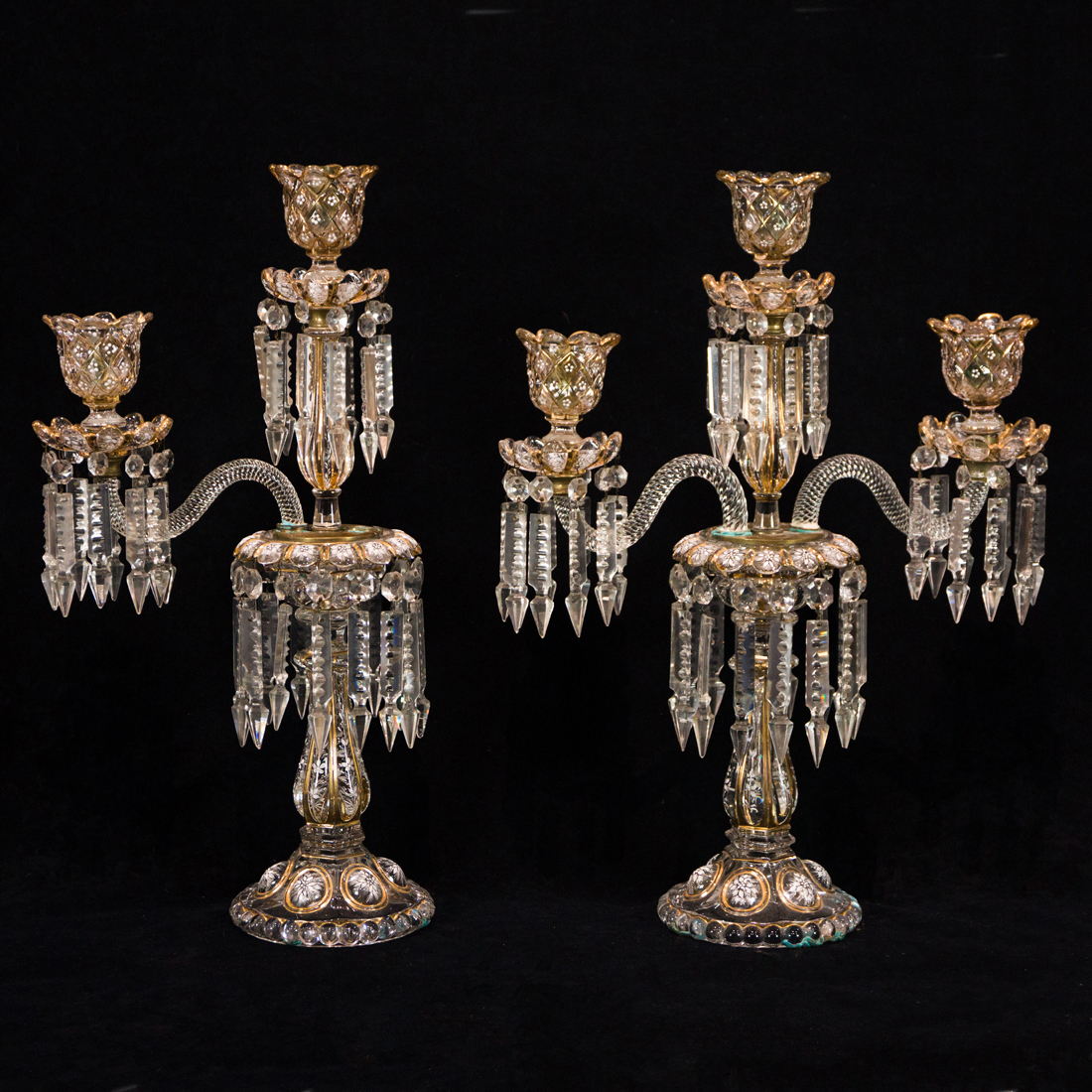 Appraisal: A PAIR OF BACCARAT ENAMELED MOLDED GLASS THREE-LIGHT CANDELABRA IN