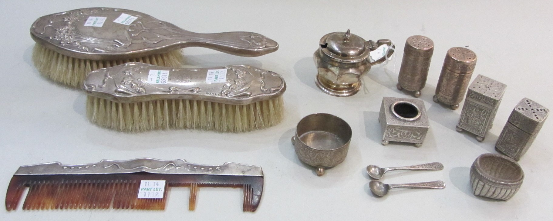 Appraisal: A silver mounted three piece part dressing set comprising a