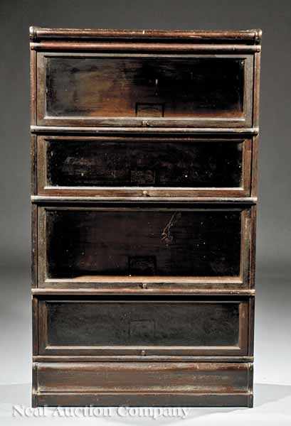 Appraisal: An American Arts and Crafts Oak Four-Tier Barrister's Bookcase early