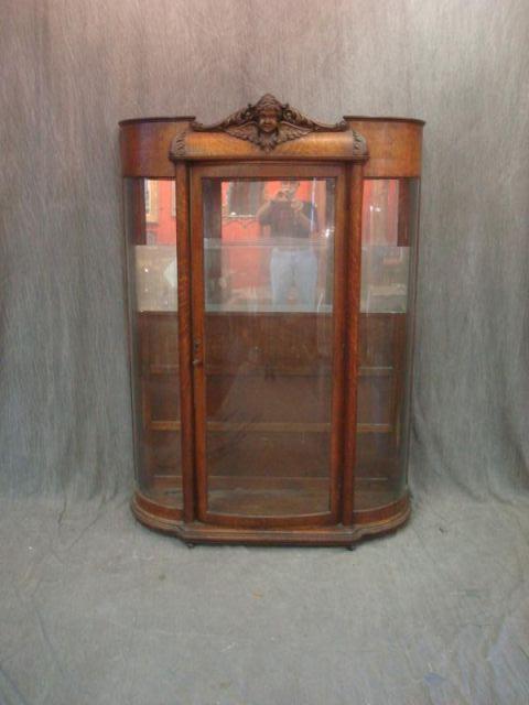 Appraisal: Oak Curved Glass China Cabinet From a Yonkers home Dimensions