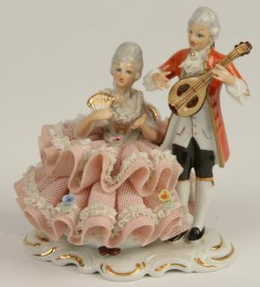 Appraisal: Dresden porcelain grouping depicting a French gentleman with mandolin serenading